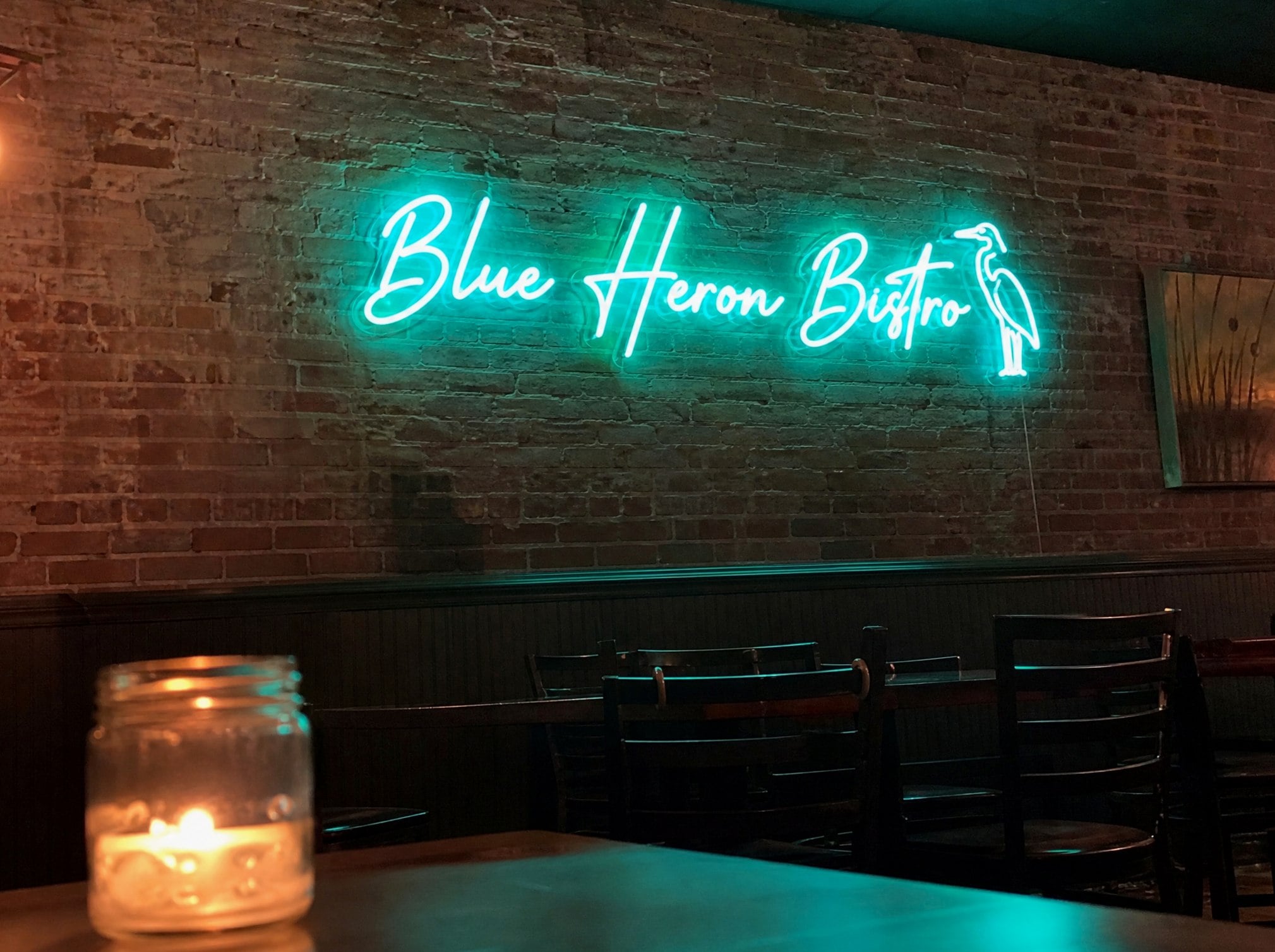 Restaurant sign with logo — customer photo